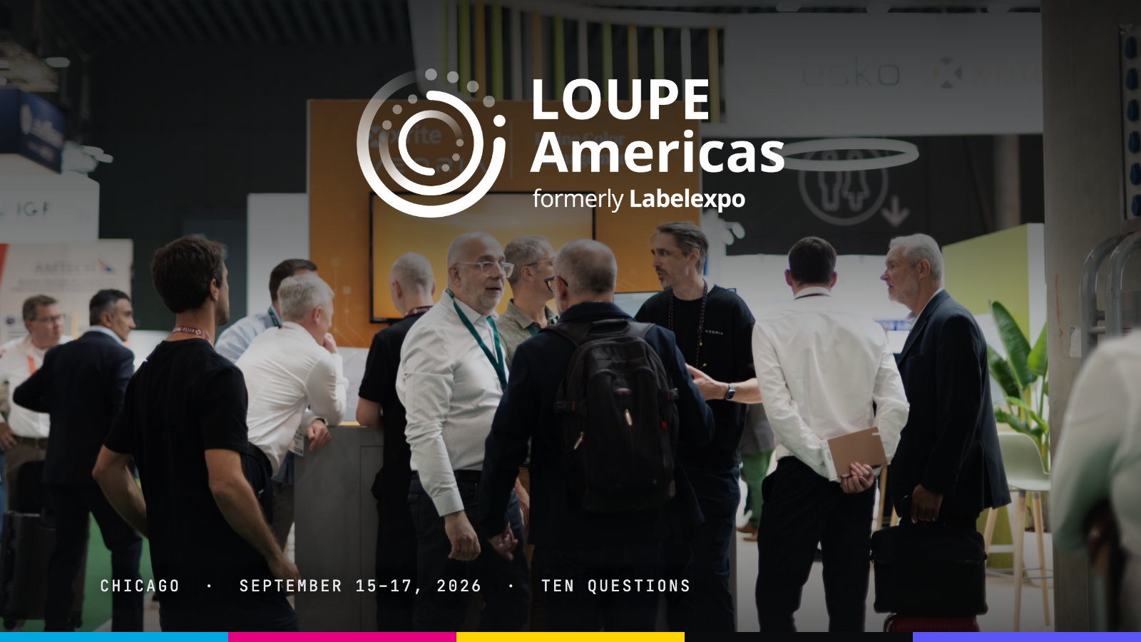 Visitors gathered around a color measurement booth on the show floor