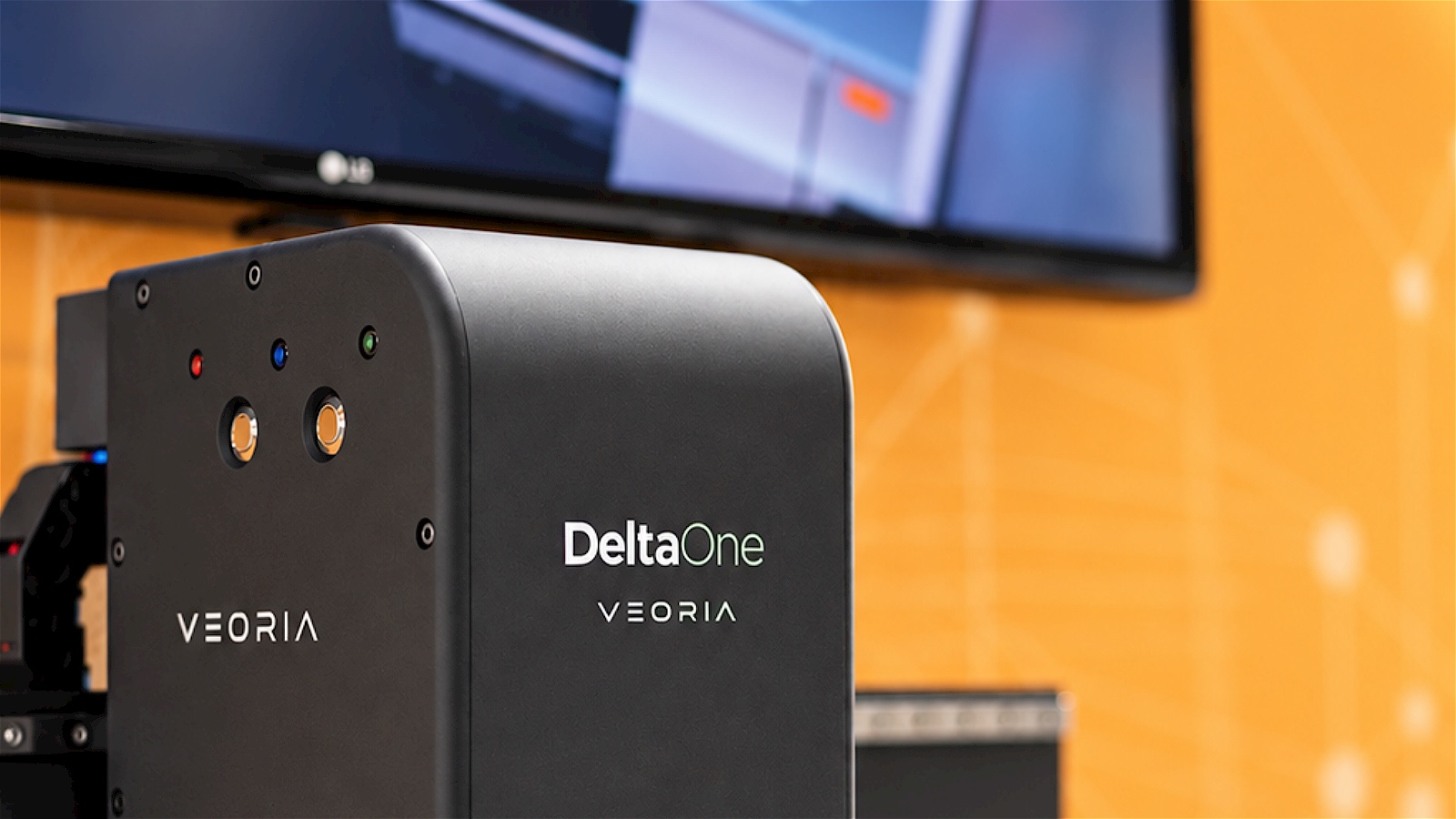 DeltaOne on the demo table — the scanner over a pre-printed demo roll